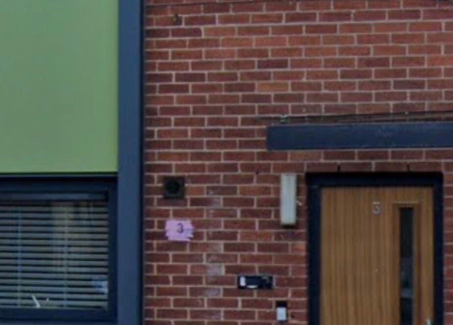Chic brick exterior of Kk’s Spray Tanning, Salford, England, GB, highlighting modern design.