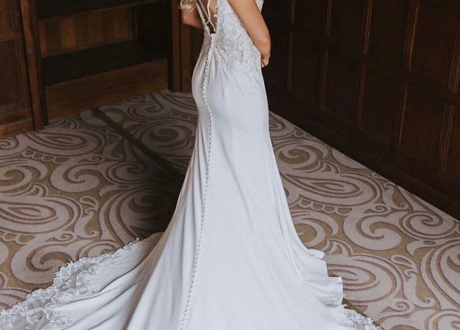 Elegant bridal gown displayed at Kk’s Spray Tanning in Salford, England, GB.