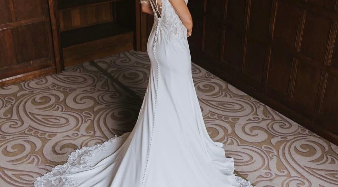 Elegant bridal gown displayed at Kk’s Spray Tanning in Salford, England, GB.