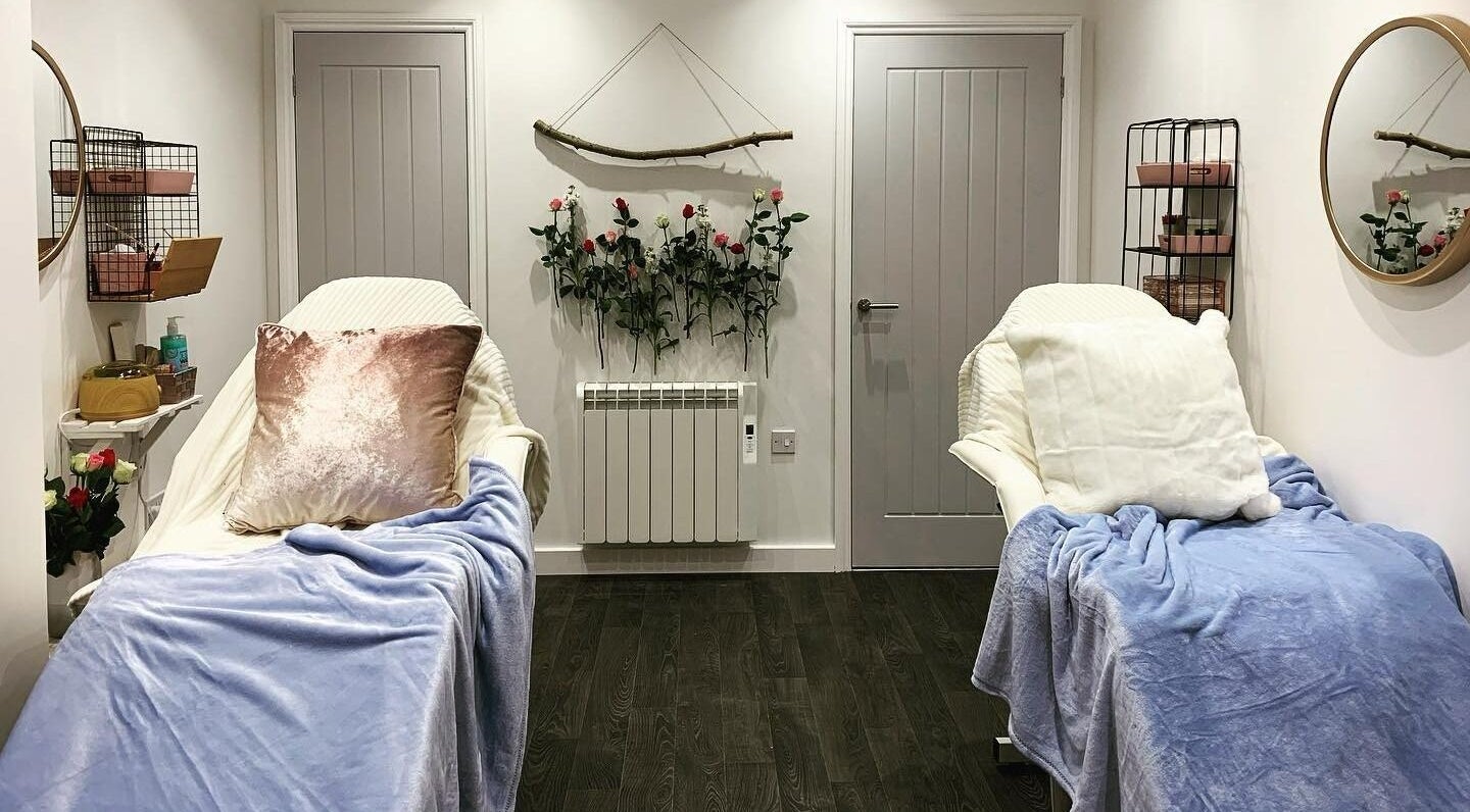 Luxury treatment rooms at Elite Beauty and Spa in Kent, England, GB, featuring plush blankets and elegant decor.