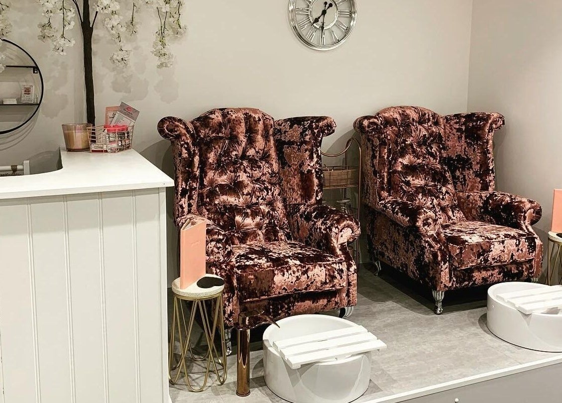Luxurious velvet chairs in Elite Beauty and Spa, Kent, England, GB, offering exquisite relaxation services.