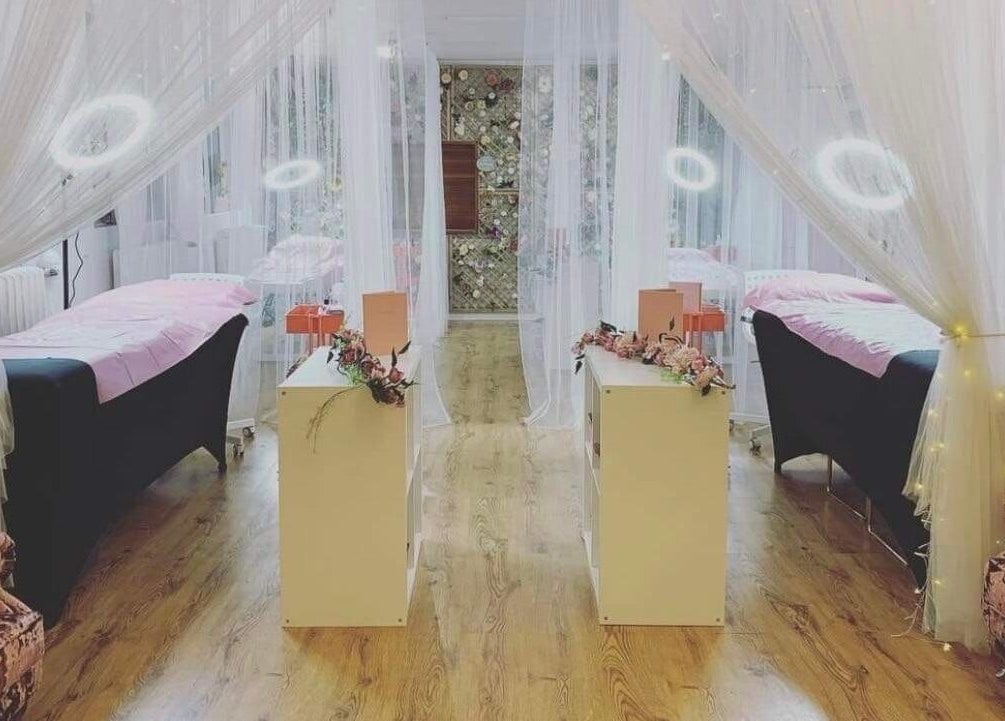 Luxurious treatment room at Elite Beauty and Spa, Kent, England, GB with elegant drapes and plush furnishings.