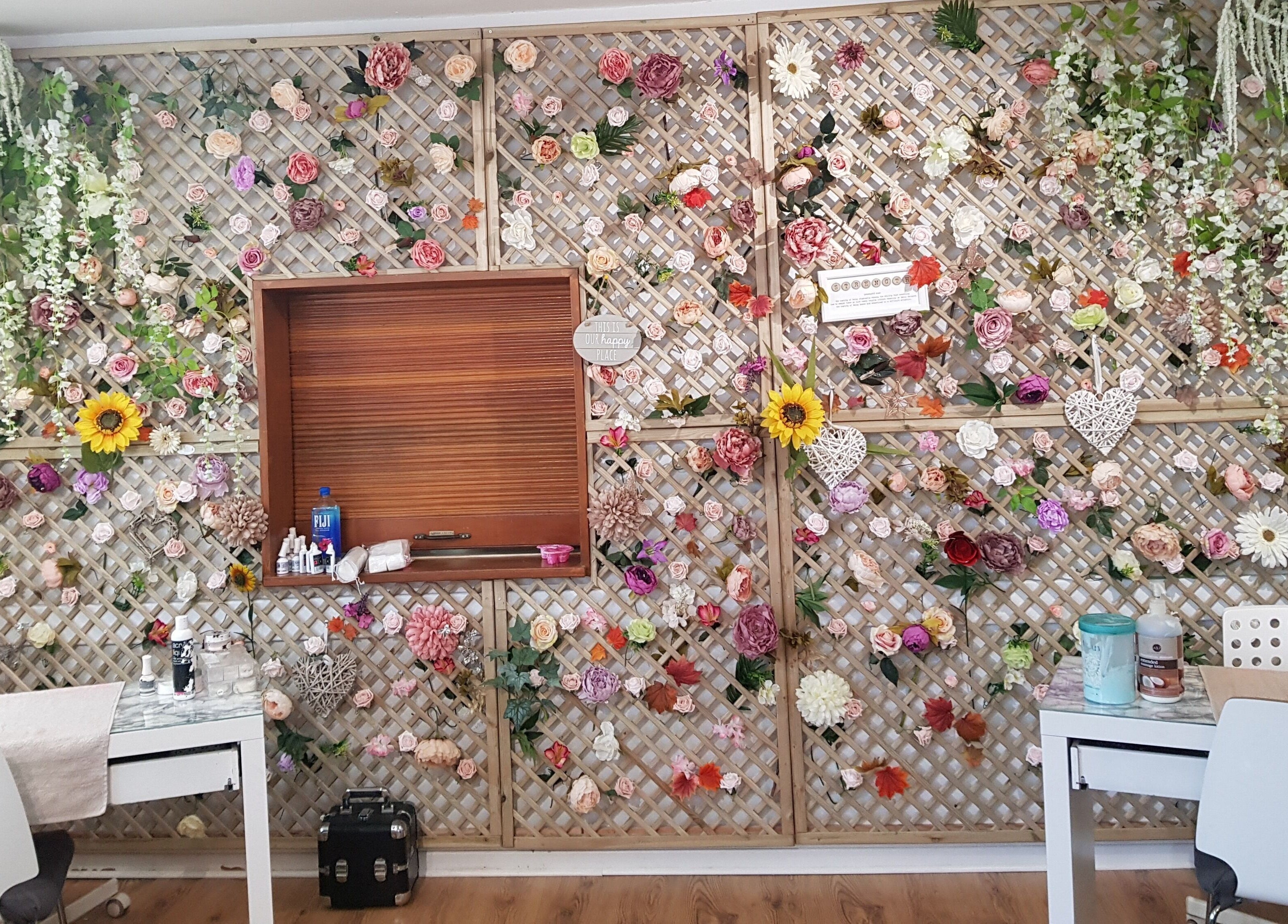 Floral wall decor at Elite Beauty and Spa, Kent, England, GB creating a serene atmosphere in the wellness room.