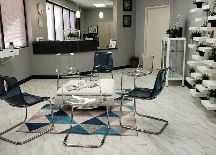 Inviting reception area at Pure MedSpa, Gilbert, Arizona, US with modern chairs and a welcoming decor.