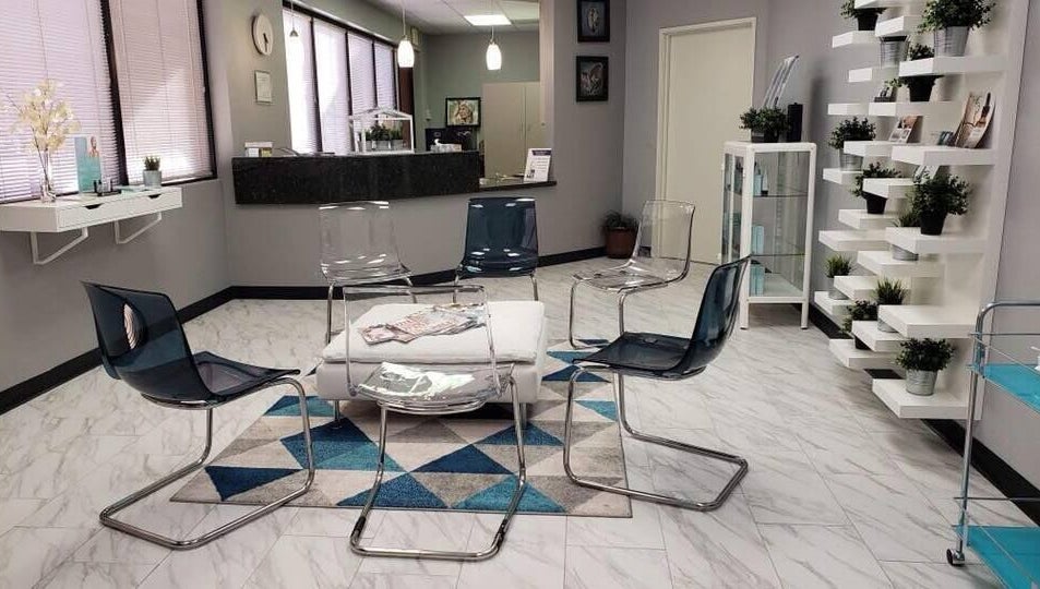 Stylish waiting area at Pure MedSpa in Gilbert, Arizona, US, featuring modern chairs and decor for inviting ambiance.