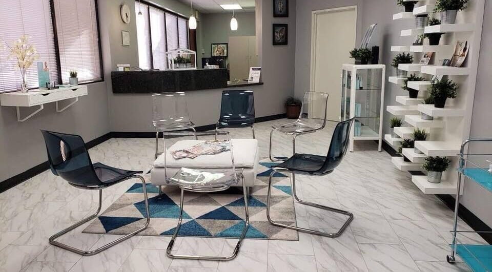 Stylish waiting area at Pure MedSpa in Gilbert, Arizona, US, featuring modern chairs and decor for inviting ambiance.