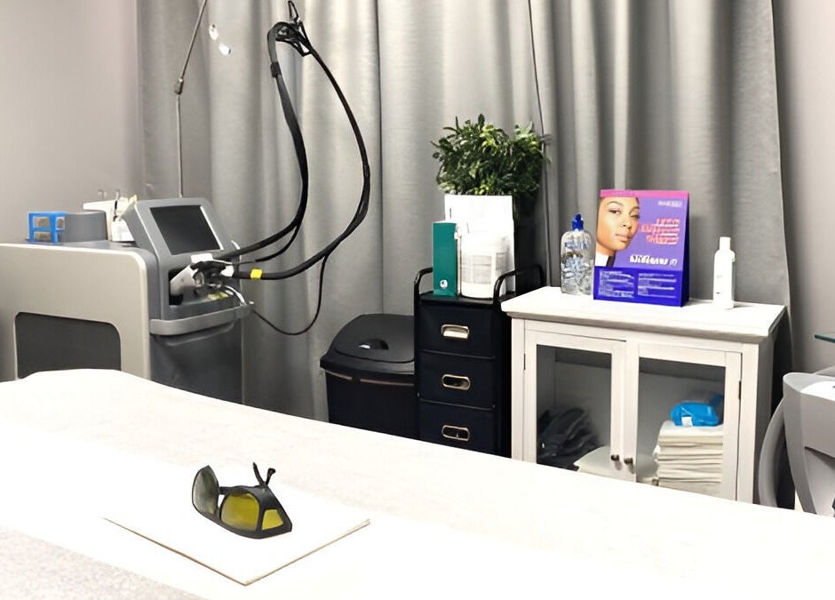Modern spa treatment room at Pure MedSpa, Gilbert, Arizona, US featuring advanced laser equipment and ambient decor.
