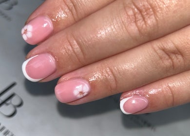 Elegant pink nails with floral design at Laura Bremner Nails and Beauty, Cardenden, Scotland, GB.