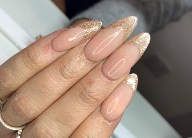 Elegant glitter-tipped nails at Laura Bremner Nails and Beauty, Cardenden, Scotland, GB.