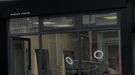 Front view of Marley Mayer Salon - Exmouth in Exmouth, England, GB, showcasing sleek modern design.