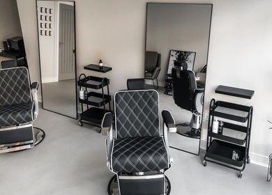 Elegant interior of Marley Mayer Salon - Exmouth offers stylish barber chairs in Exmouth, England, GB.