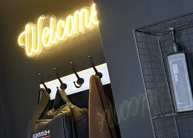 Marley Mayer Salon - Exmouth features a welcoming neon sign. Stylish interior decoration in Exmouth, England, GB.
