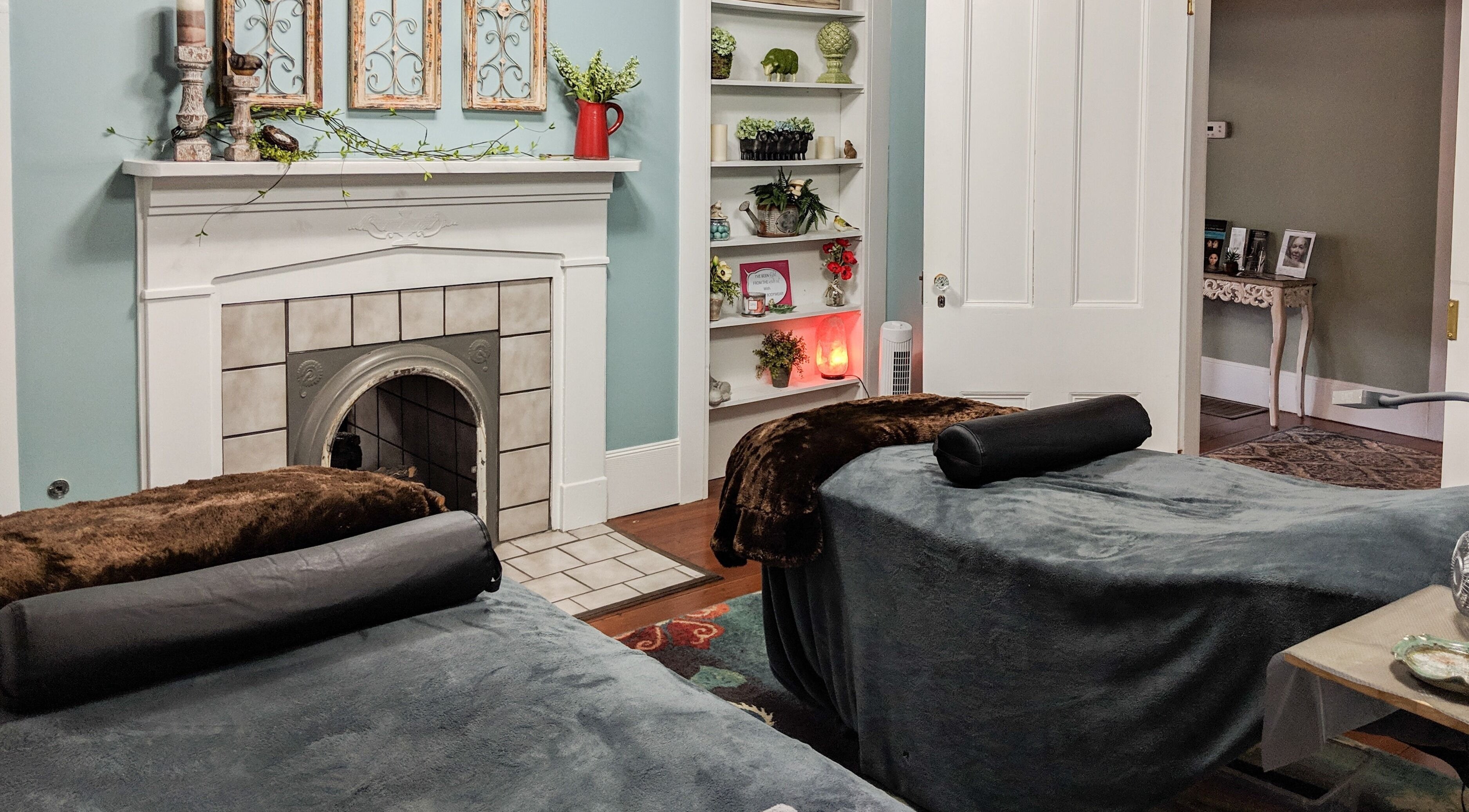 Relaxing spa room at Ams Studios in Prattville, Alabama, US featuring plush bedding and serene decor.