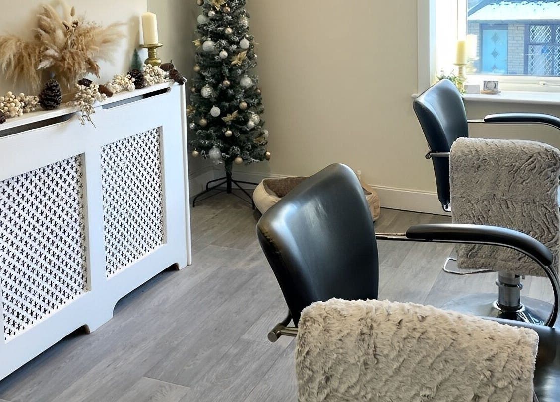Elegant interior of Hair Extensions by Becci in Liversedge, England, GB with festive decor and plush seating.