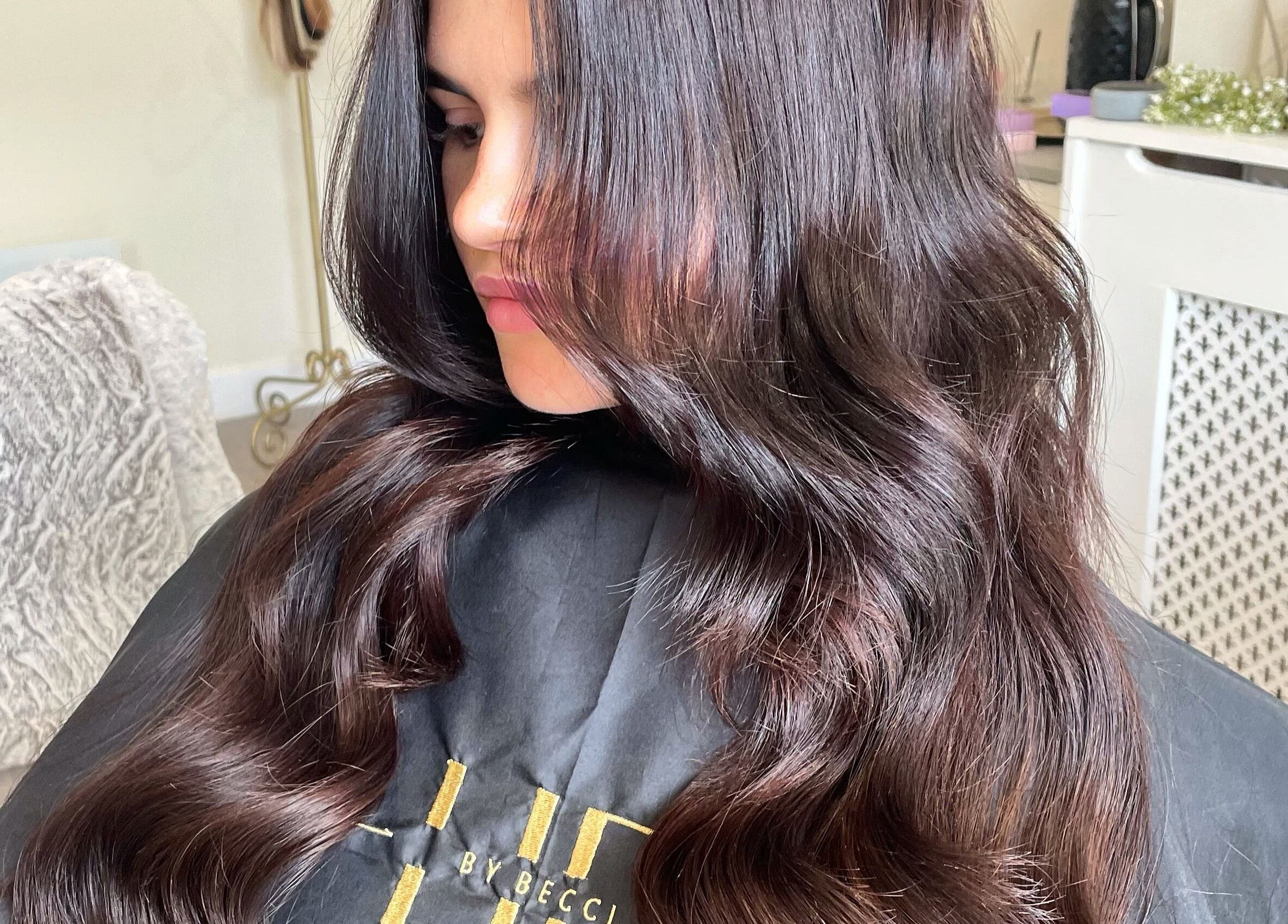 Elegant hair extensions at Hair Extensions by Becci, Liversedge, England, GB featuring silky, flowing dark waves.