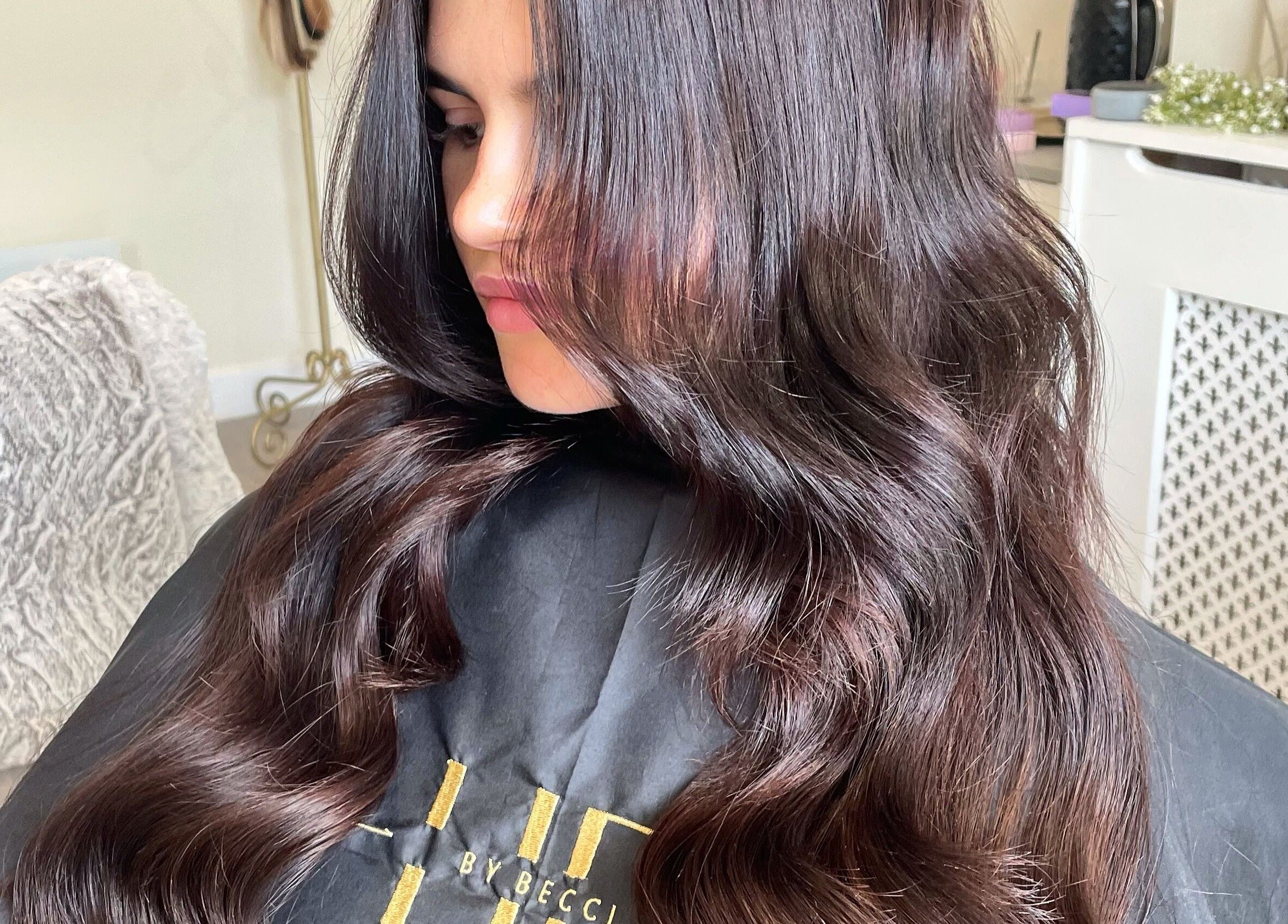Elegant hair extensions at Hair Extensions by Becci, Liversedge, England, GB featuring silky, flowing dark waves.
