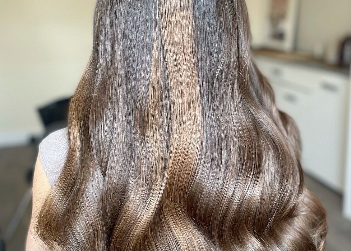 Elegant, wavy brown hair extensions at Hair Extensions by Becci, Liversedge, England, GB.