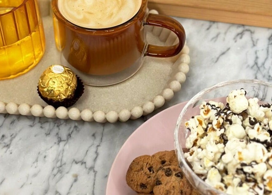 Delicious treats and coffee at Lávue Hair, Wavell Heights, Queensland, AU, offering a relaxing experience.