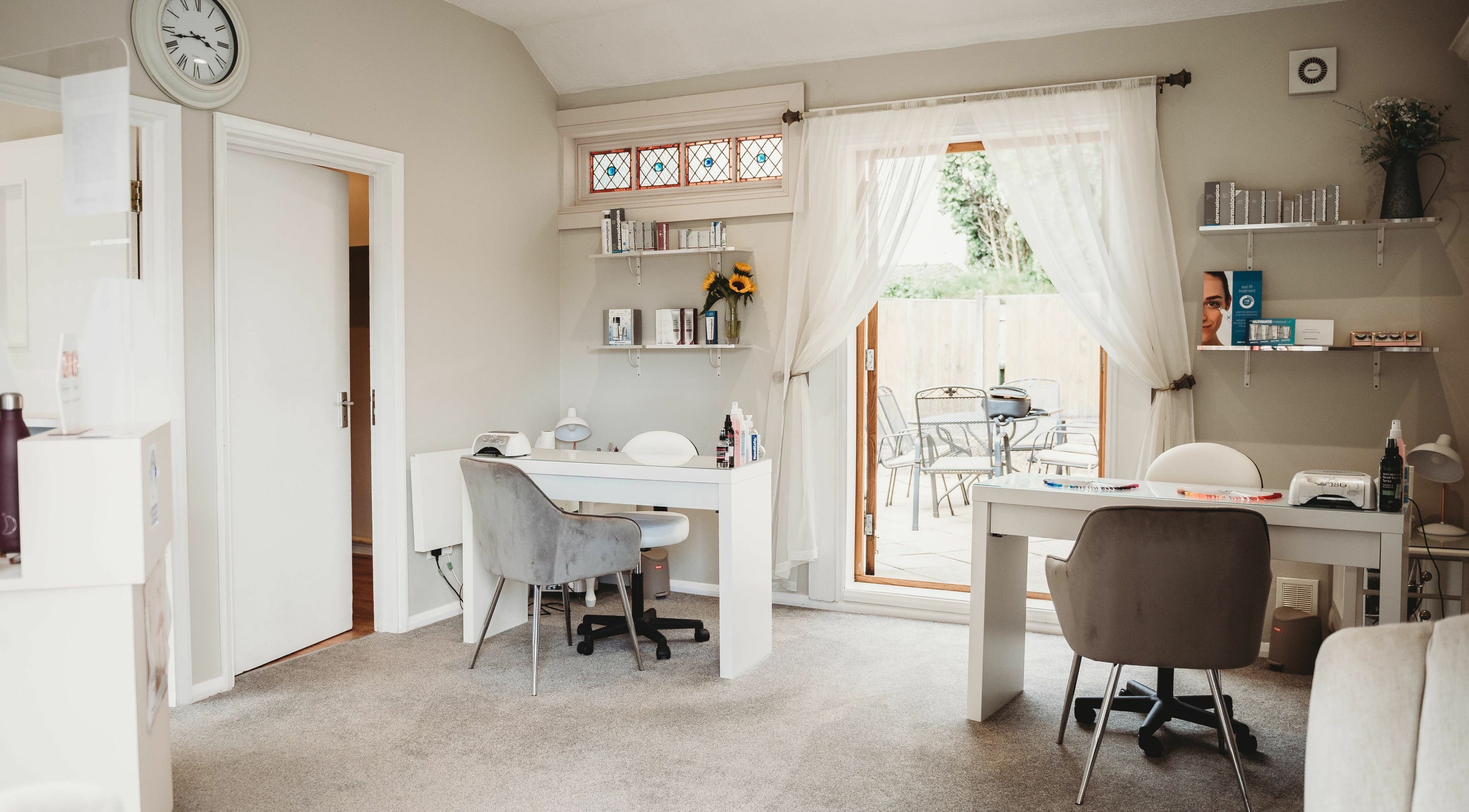 Elegant treatment area at A.M Beauty Clinic in Billingshurst, England, GB, with modern decor and natural light.