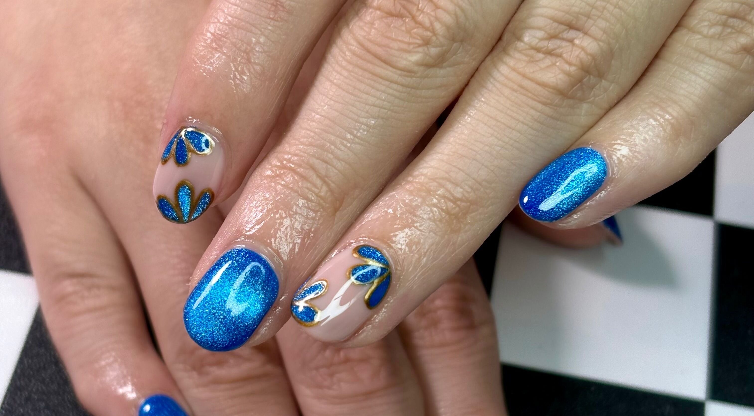 Blue glitter nail art at KBeauty PLEASE READ POLICIES DOWN BELOW, Lugoff, South Carolina, US.