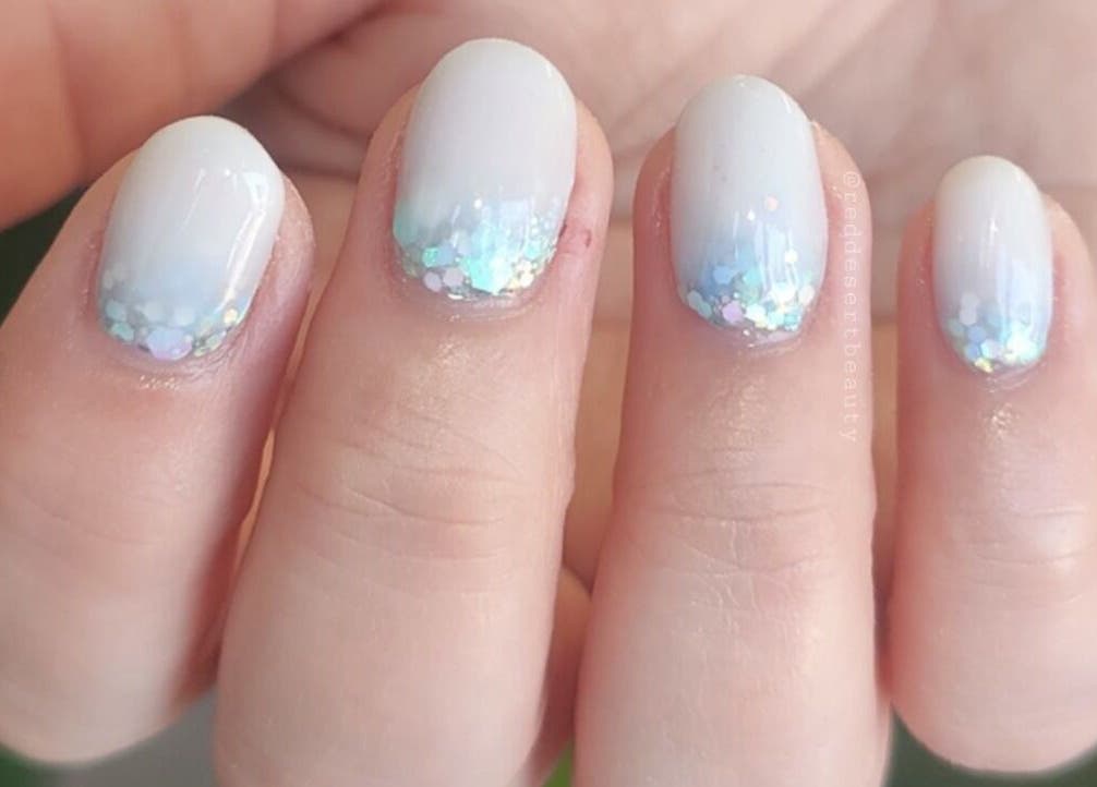 Elegant glitter nails at Red Desert Beauty, Uleybury, South Australia, AU, showcasing delicate color details.