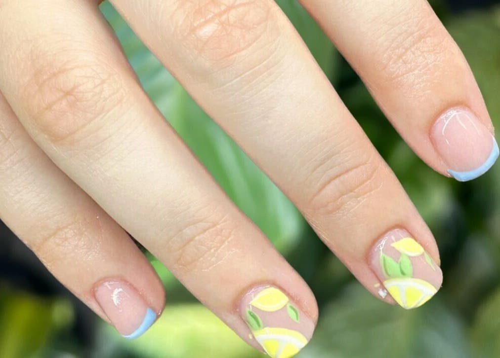 Stylish lemon-themed nail art at Red Desert Beauty, Uleybury, South Australia, AU.