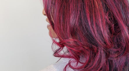 Elegant crimson hair styling at Gareth at MITI BEAUTY, Bristol, England, GB.