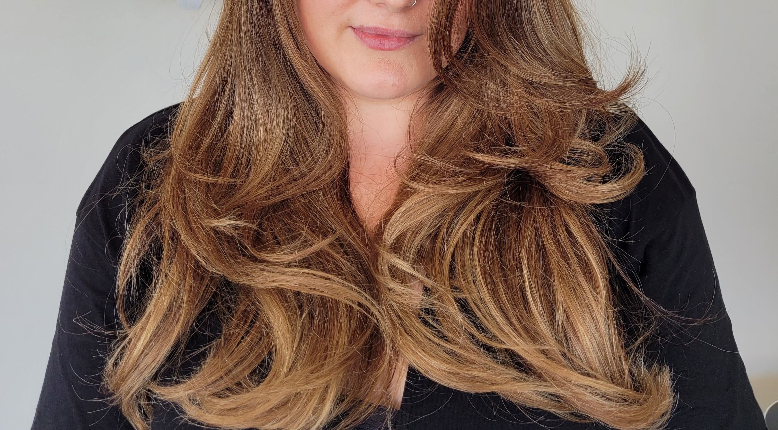 Stylish long layered hair styled at Gareth at The Loft Hair Studio in Bristol, England, GB.