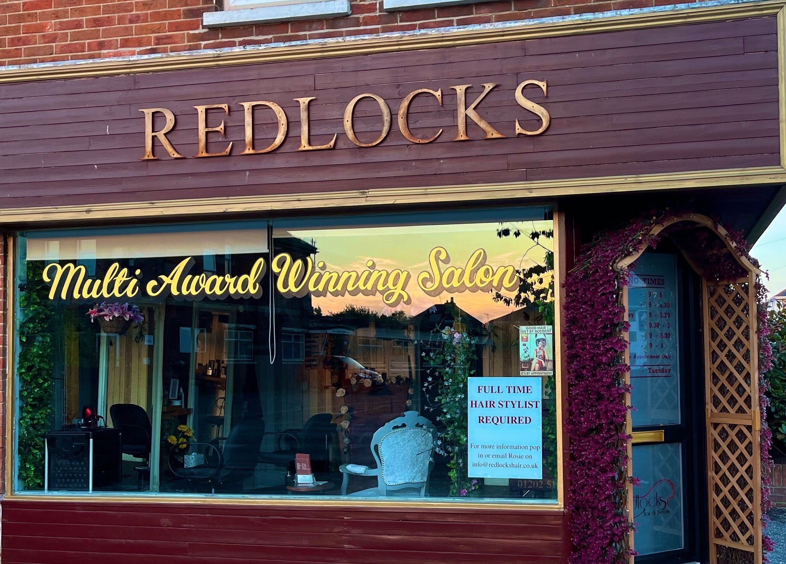 Charming exterior of Redlocks Hair, a multi-award-winning salon in Bournemouth, England, GB.