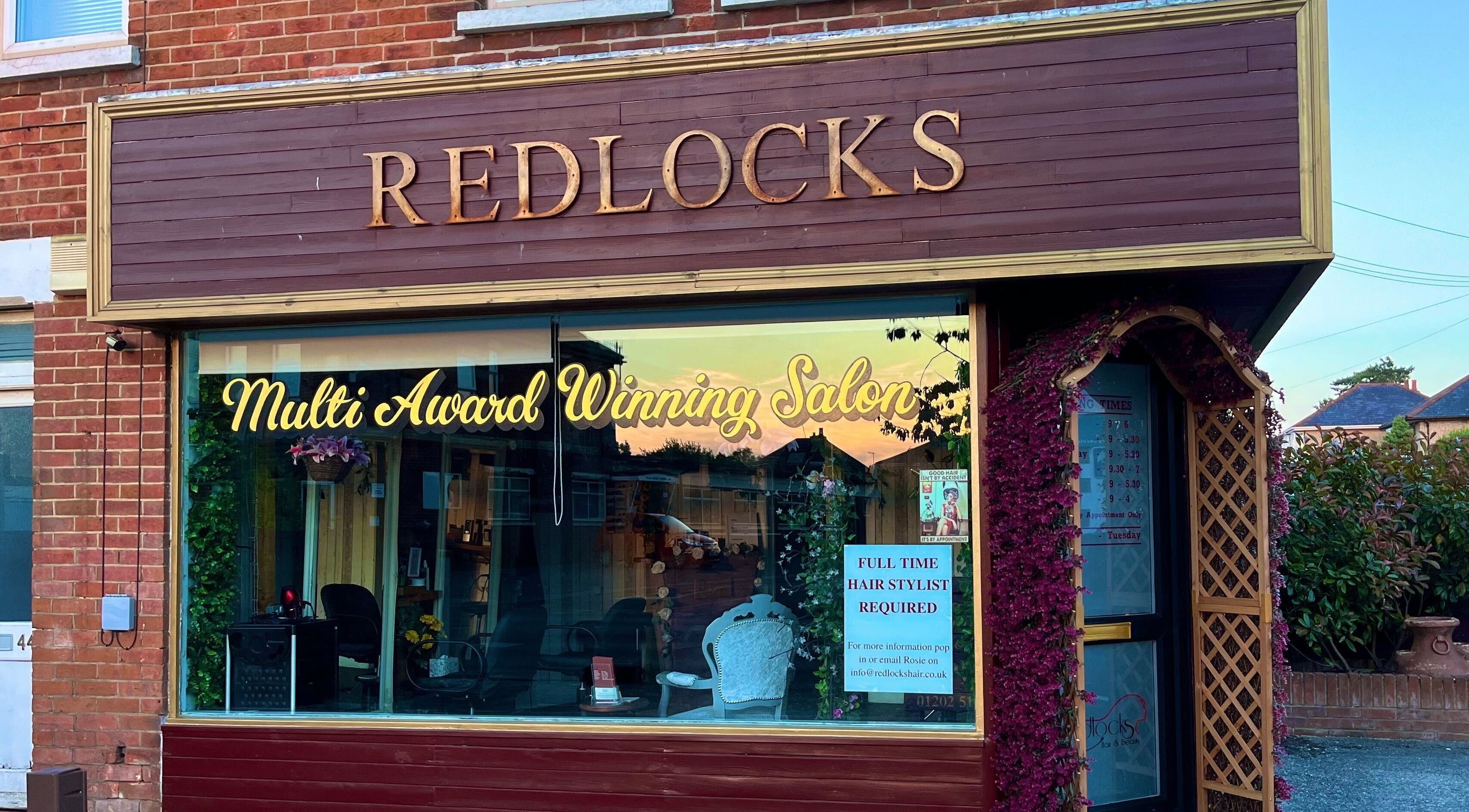 Charming exterior of Redlocks Hair, a multi-award-winning salon in Bournemouth, England, GB.