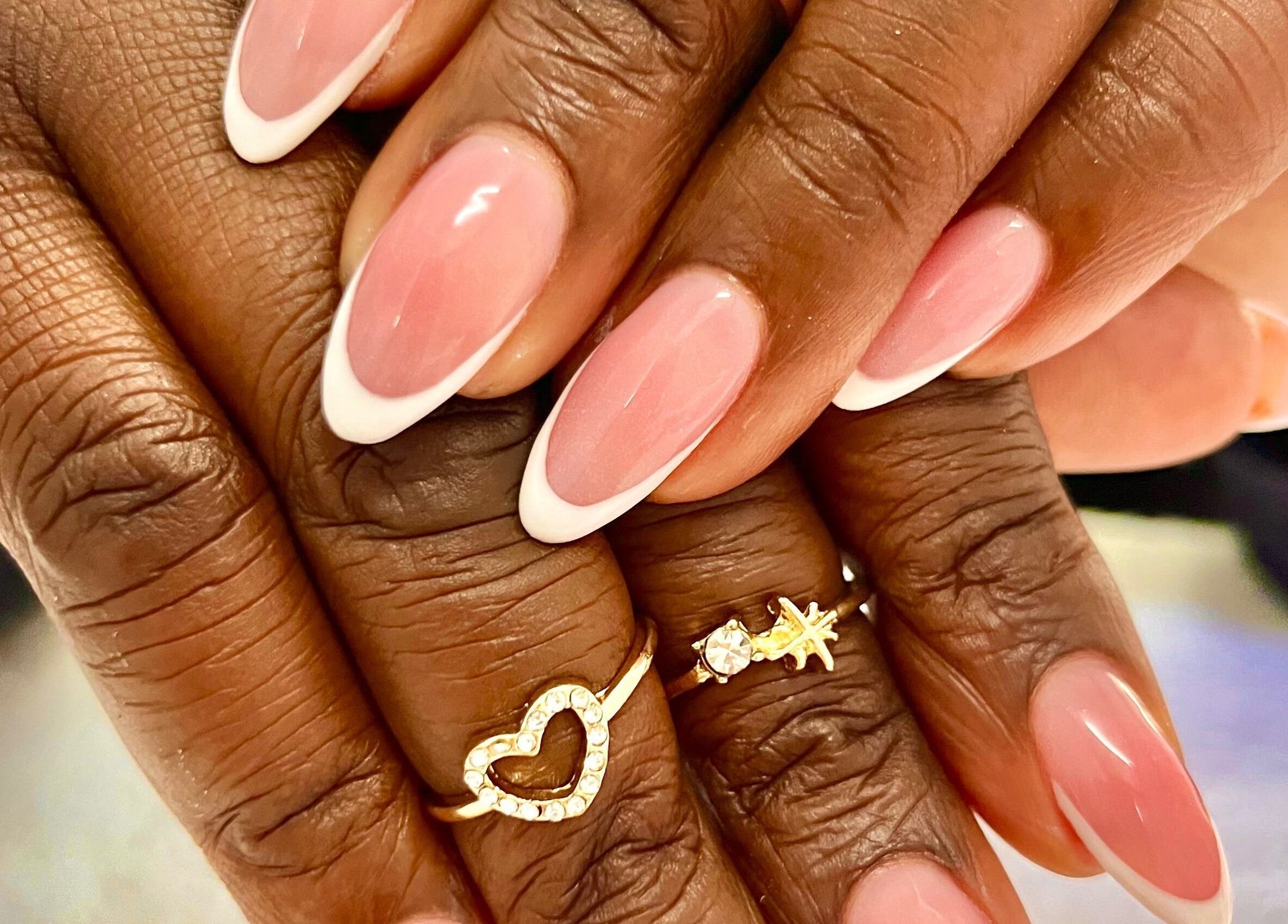 French manicured hands with rings at Lifestyle on Location: Flight Centre East Rand, Boksburg, Gauteng, ZA.