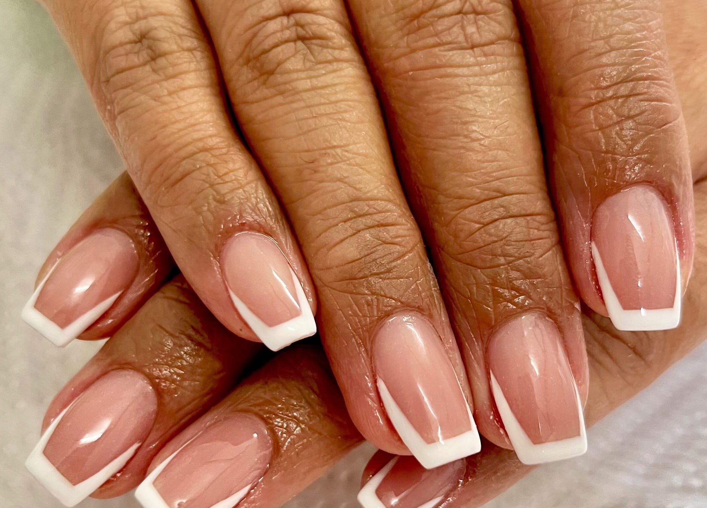 Elegant French manicure at Lifestyle on Location: Flight Centre East Rand, Boksburg, Gauteng, ZA.