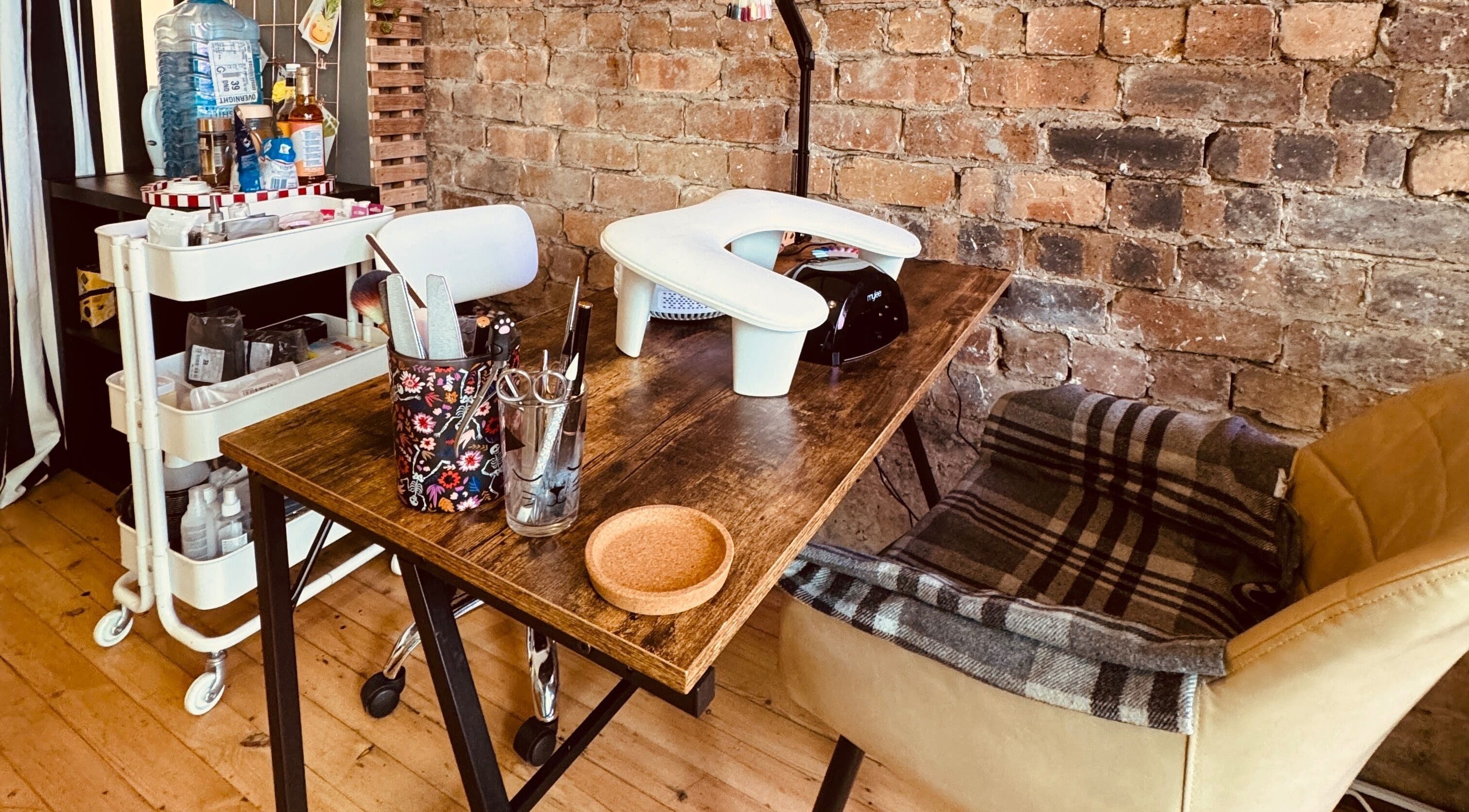 Manicure station at Peak Physique and Bodywork Kirkcaldy, Kirkcaldy, Scotland, GB, with rustic decor.