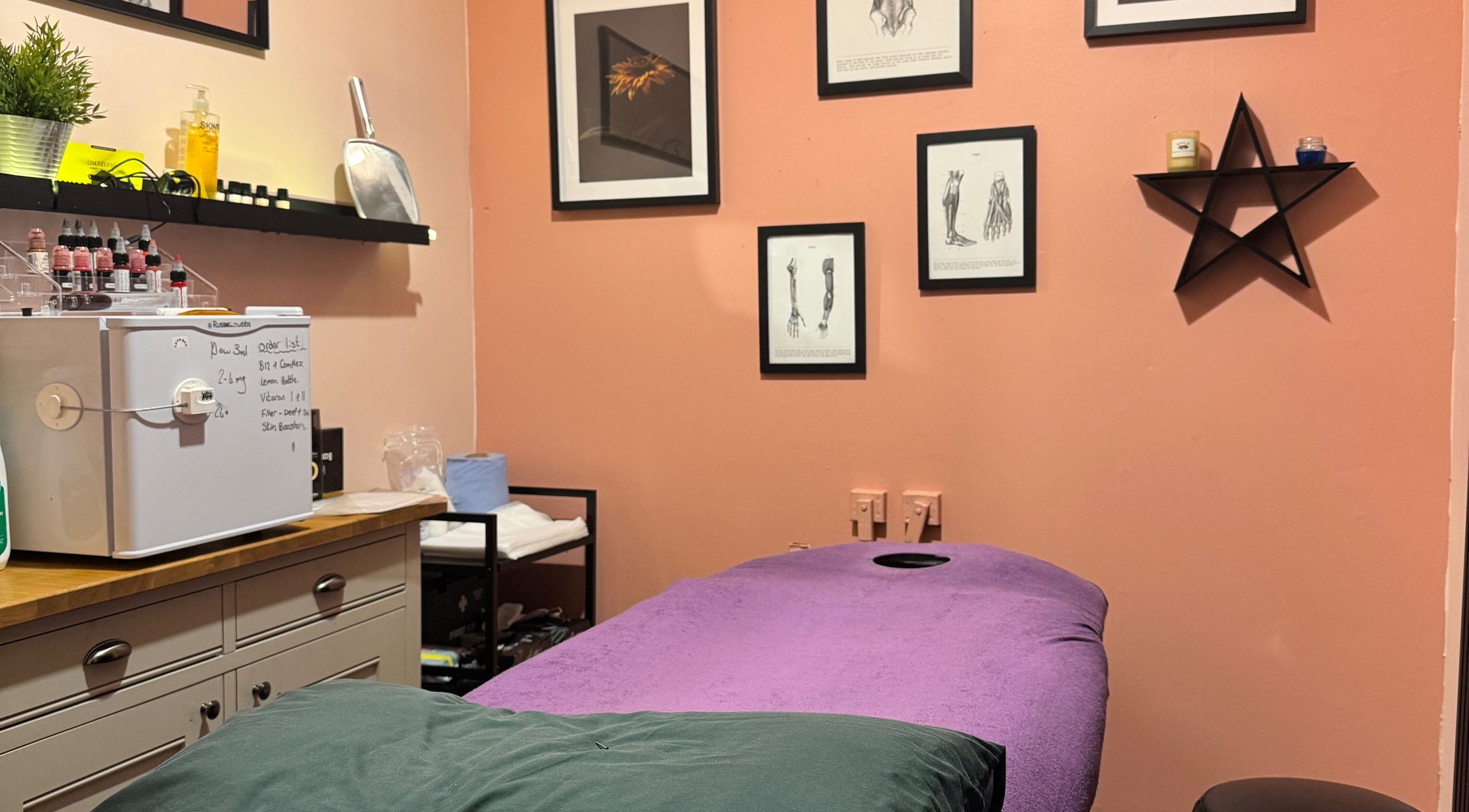 Relaxing treatment room at Peak Physique and Bodywork Kirkcaldy, featuring a massage table and serene decor, Kirkcaldy, Scotland, GB.