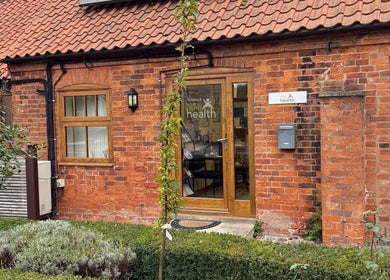 Beauty by Tracy Polak entrance, a cozy brick building in Eakring, England, GB.