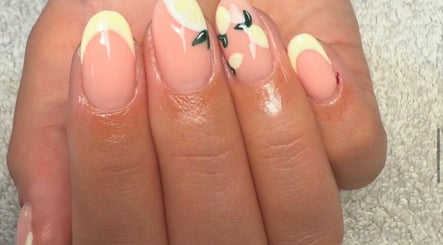 Elegant lemon-themed nail art at Beauty by Shelli in Howden, England, GB. Perfect for a summer vibe.