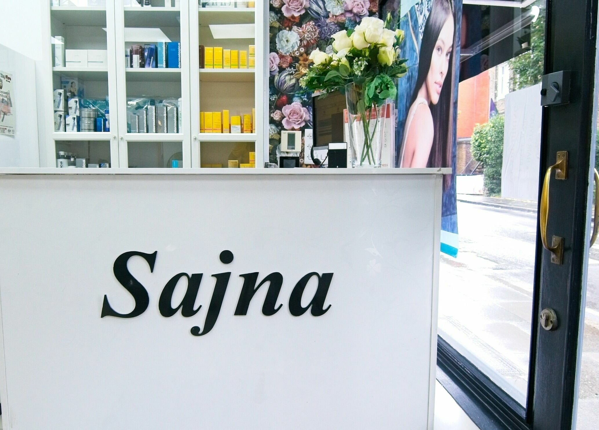 Reception at Sajna Hair & Beauty, Wimbledon, showcasing sleek interior in London, England, GB.