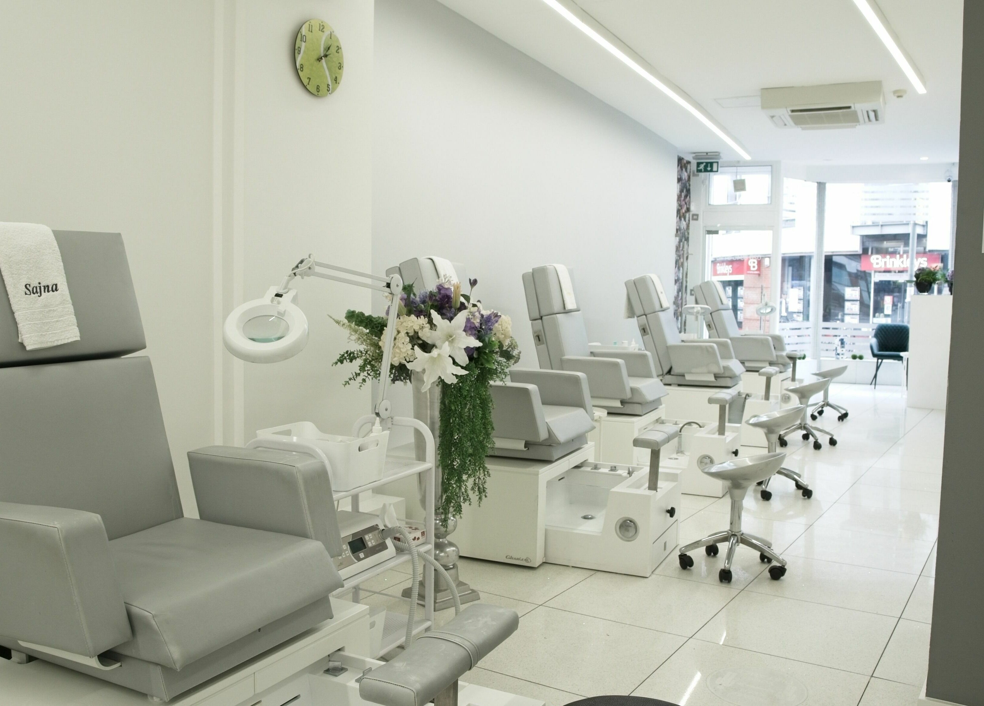 Elegant spa chairs at Sajna Hand & Foot Spa, Wimbledon, London, England, GB, offering comfort and relaxation.