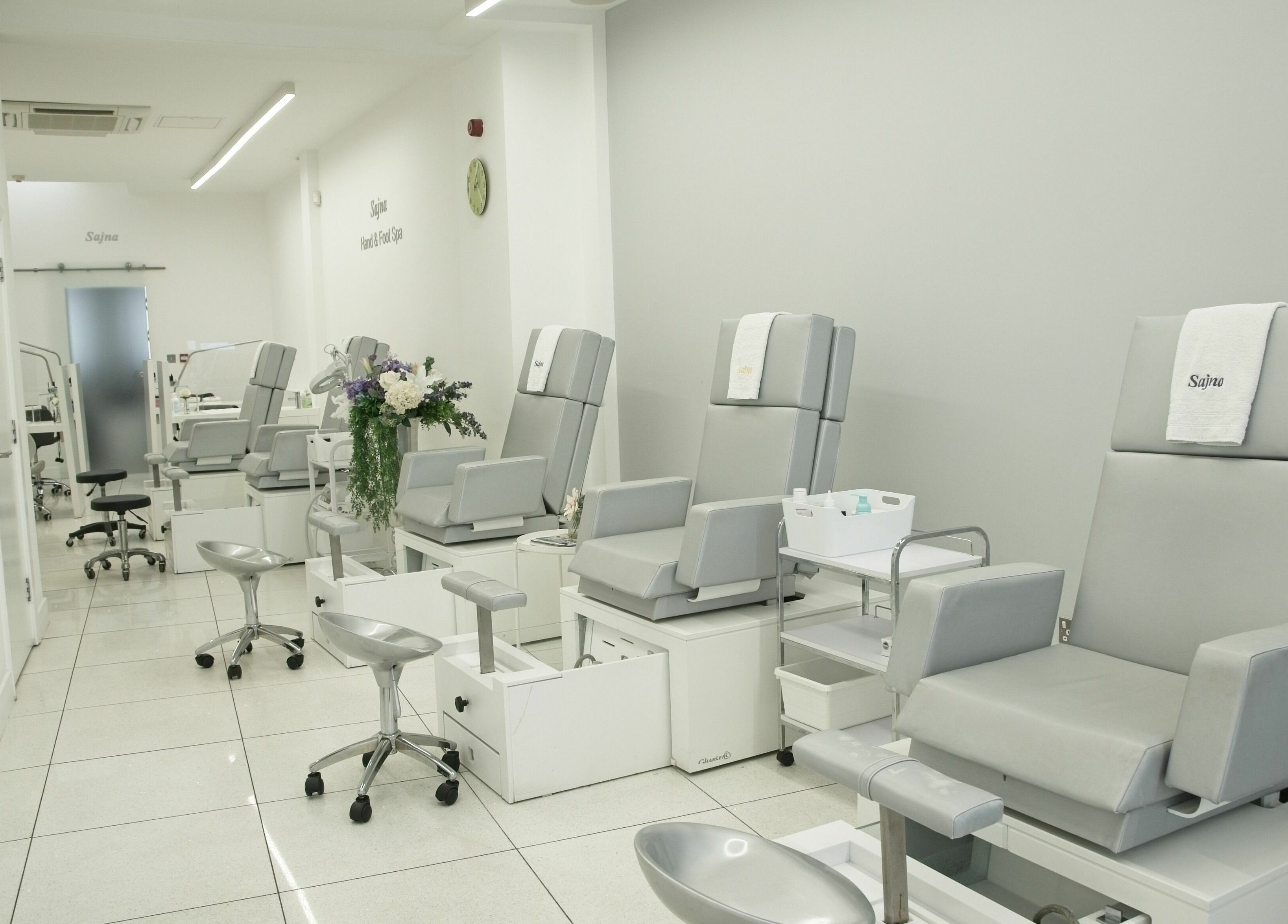 Modern pedicure chairs at Sajna Hand & Foot Spa, Wimbledon, London, England, GB; a serene and stylish venue.