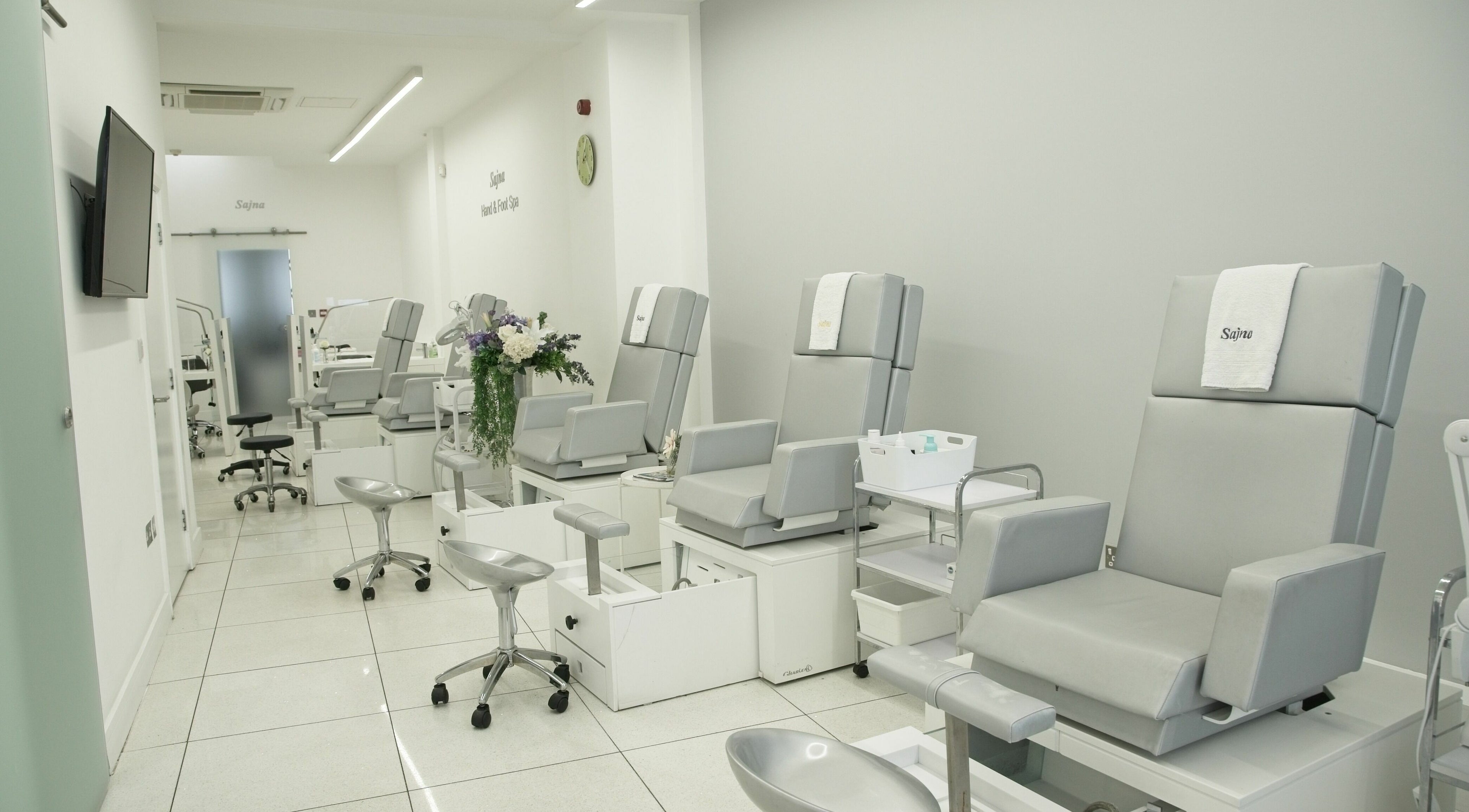 Modern pedicure chairs at Sajna Hand & Foot Spa, Wimbledon, London, England, GB; a serene and stylish venue.