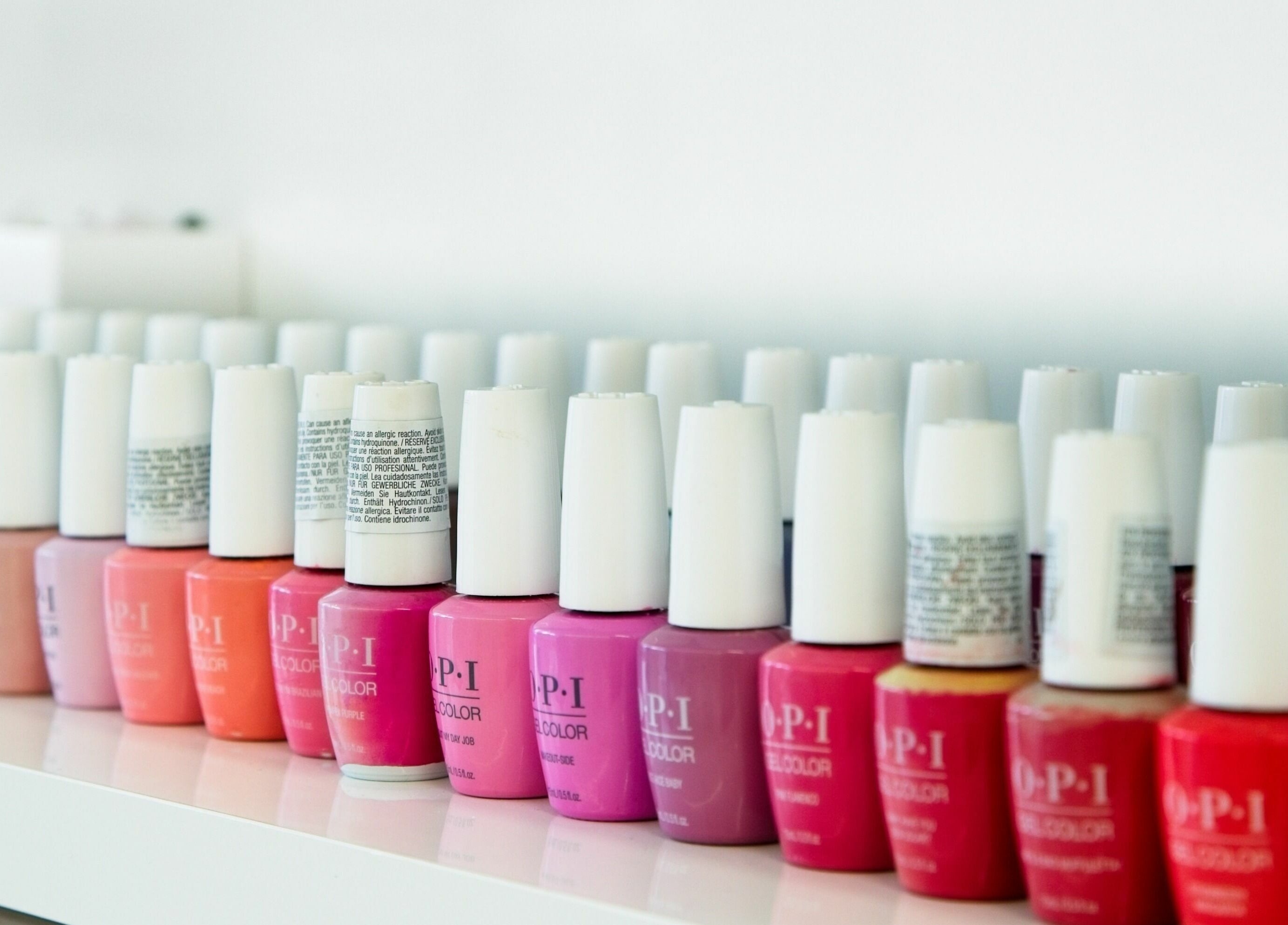 Nail polish collection at Sajna Hand & Foot Spa, Wimbledon, London, England, GB, showcasing vibrant colors.