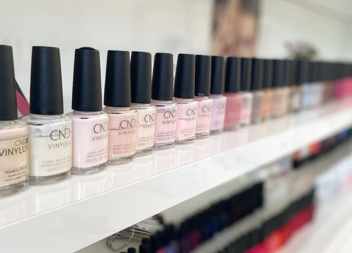 Row of nail polishes at Sajna Beauty Spa Clapham, London, England, GB offering diverse manicure options.