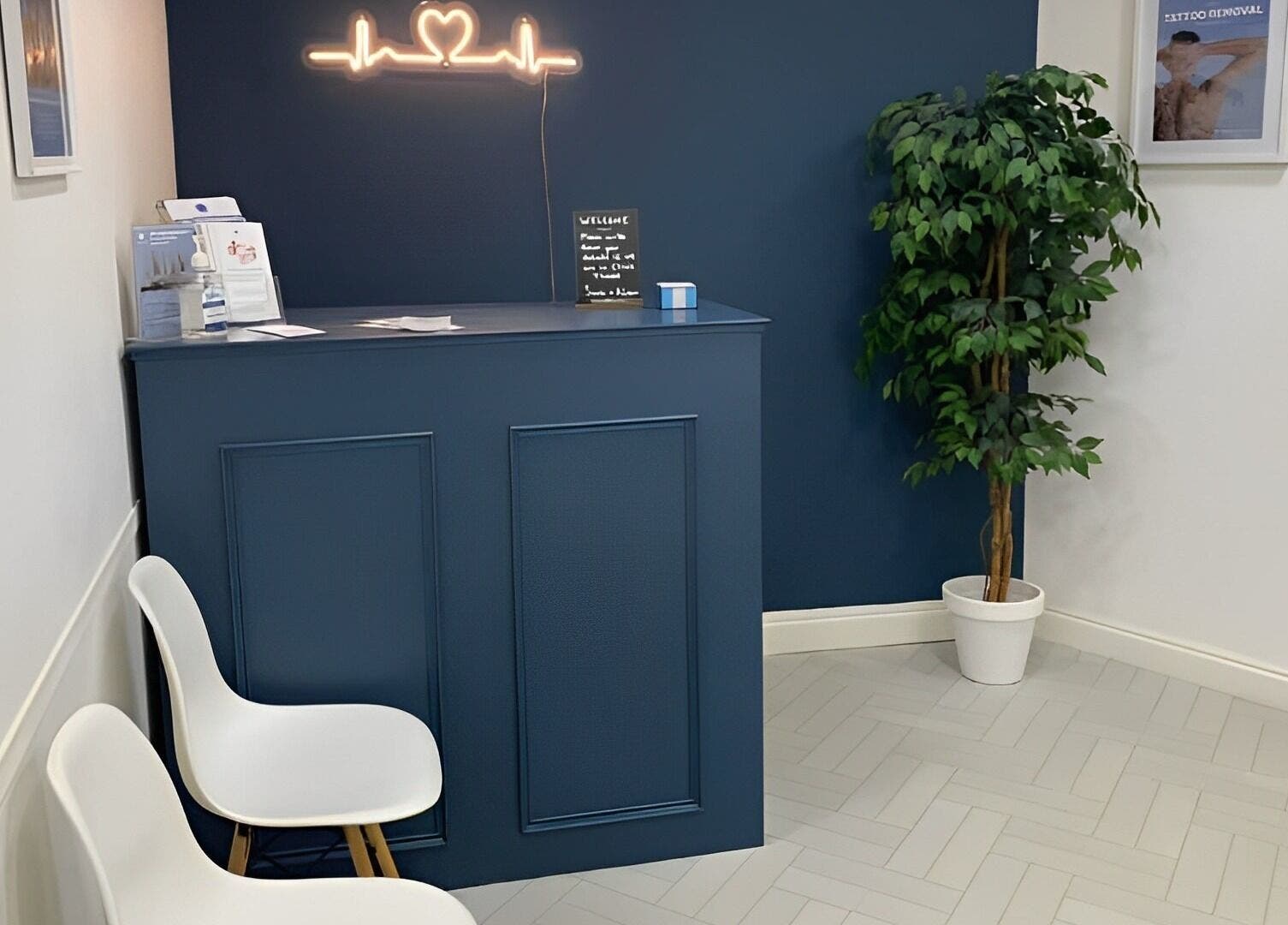 Reception area of Pulsar Laser Studio in Bolton, England, GB, featuring chic decor and a welcoming ambiance.