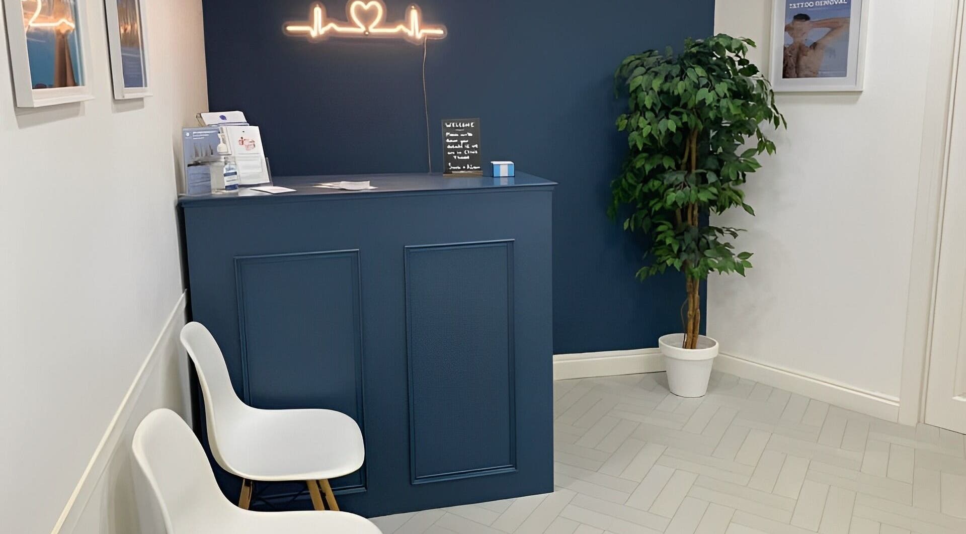 Reception area of Pulsar Laser Studio in Bolton, England, GB, featuring chic decor and a welcoming ambiance.