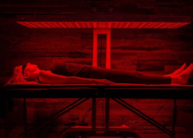 Client receiving red light therapy at Alfred's Wellness, Willowbrook, Illinois, US.