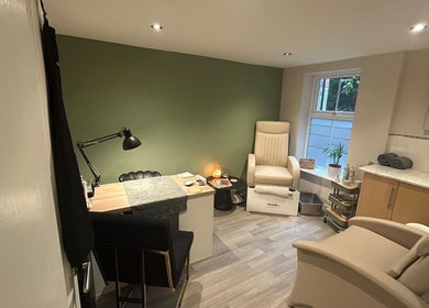 Relaxing interior of The Salon At Twenty Four, Woodford Halse, England, GB with plush chairs and calming decor.