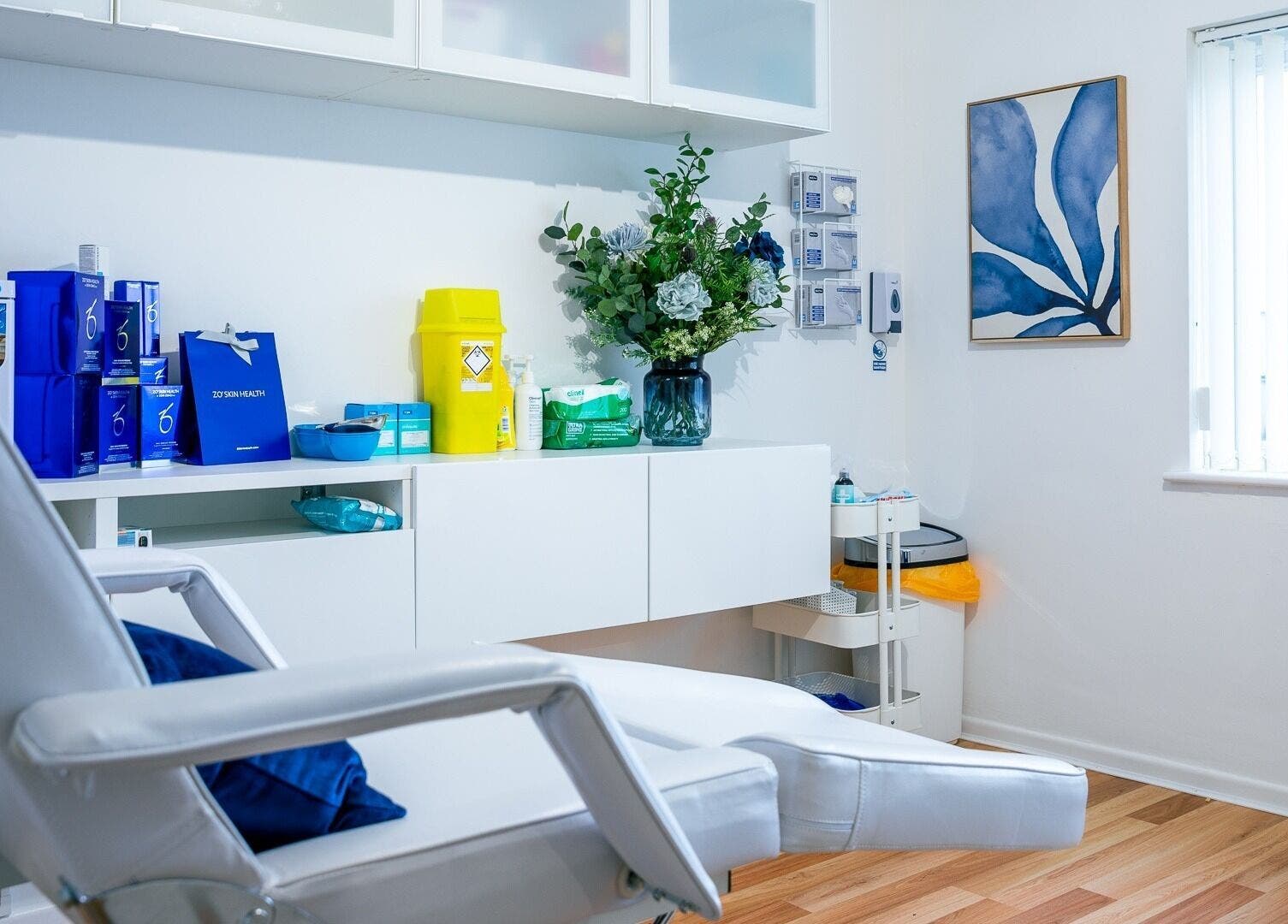 Relaxing therapy room at Gower Skin Aesthetics in Kittle, Wales, GB, featuring a white treatment chair.