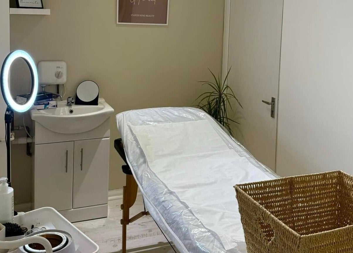Cozy treatment room at Gower Skin Aesthetics, Kittle, Wales, GB, featuring a tranquil ambiance and modern equipment.