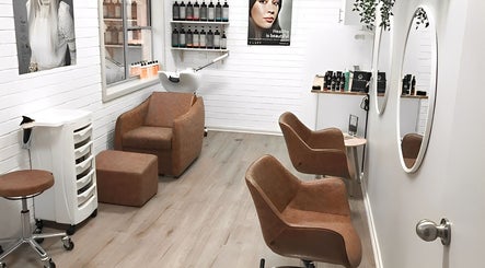 Eco Salon Day Spa's inviting hair styling area in Bermagui, New South Wales, AU with modern decor.