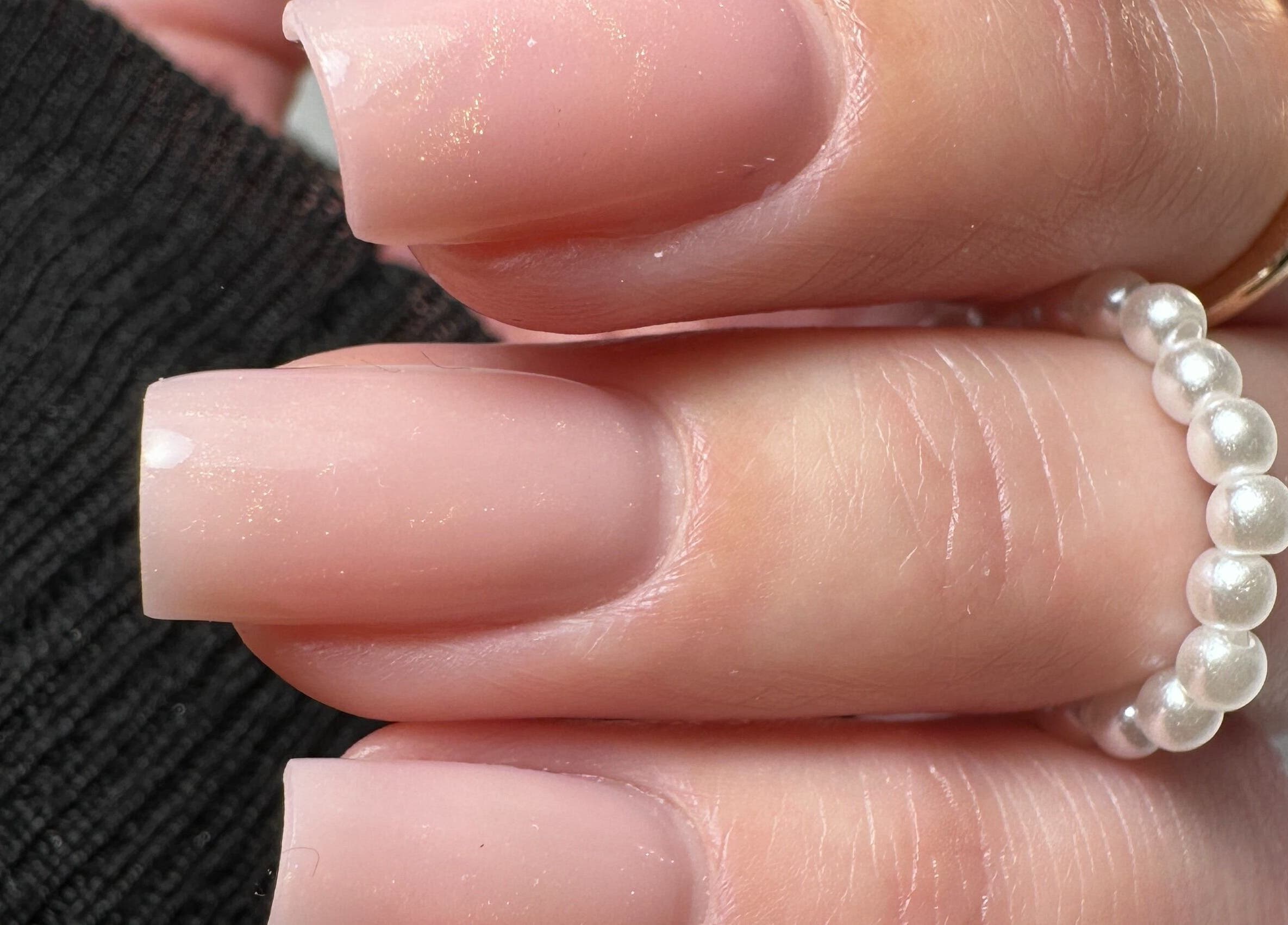 Elegant nude nails with pearl ring, SBI SALON, Englishtown, New Jersey, US.